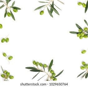 Frame or borders made of fresh green olive fruit with leaves isolated on white background. Top view.