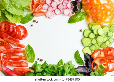 Frame Of Chopped Fresh Vegetables For Salad On White Background