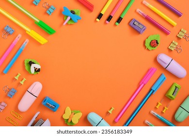 Frame of colorful school and office stationery set on orange background. Bee-shaped eraser. Flatly. - Powered by Shutterstock