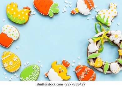 Frame of Easter cookies top view. Happy Easter greeting card.