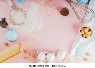 Frame of food ingredients for baking on a gently pink pastel background. Cooking flat lay with copy space. Top view. Baking concept. Mockup. - Shutterstock ID 1061986550
