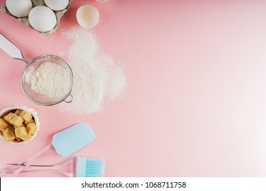 Frame of food ingredients for baking on a gently pink pastel background. Cooking flat lay with copy space. Top view. Baking concept. Mockup.