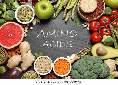 Frame Of Fresh Vegetables, Fruits And Seeds On Black Table, Flat Lay. Sources Of Essential Amino Acids