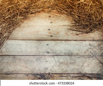 Frame Of Hay On Rustic Wooden Floor With Space For Text