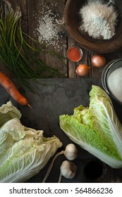 Frame Of The Ingredients For Kimchi On The Table Vertical