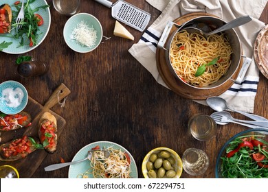 Frame Of Italian Pasta, Snacks End Wine On A Wooden Table. Italian Dinner Table Concept