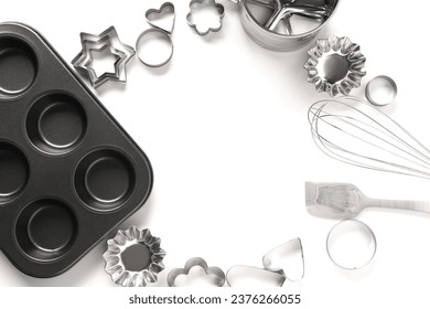 Frame made from baking utensils and cookie cutters isolated on white background - Powered by Shutterstock