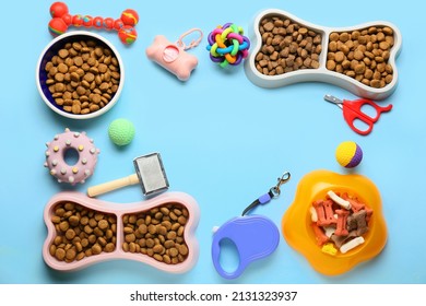 Frame made of different pet care accessories and food on color background