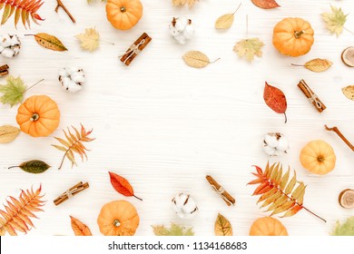 Frame Made Of Dry Autumn Leaves, Pumpkins And Cotton. Fall Flat Lay. Top View.  Autumn Minimal Concept