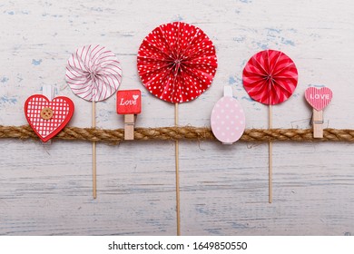 Frame made of easter eggs and spring flowers on white wooden background. Easter composition. top view with copy space