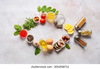 Frame made of fish oil pills and healthy products on grunge background - Shutterstock ID 2052058712