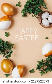 Frame Made Of Green Flowers And Easter Golden Eggs. Holiday Concept. Happy Easter Card