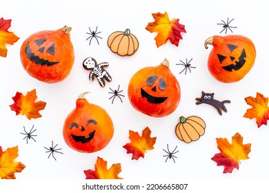 Frame Of Orange Halloween Pumpkins And Funny Cookies, Top View