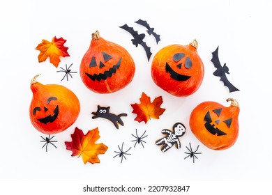 Frame Of Orange Halloween Pumpkins And Funny Cookies, Top View