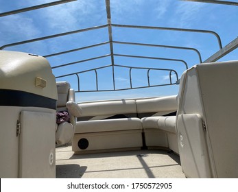 The Frame Of The Pontoon Dock Stands Above Us As We Prepare For A Ride On The Lake.