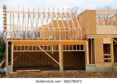 The Frame Of The Rafters And The Garage Of The Plywood House Wall