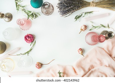 Frame With Roses, Lavender, Green Eucalyptus Branches, Candles, Candlesticks, Pink Dress Isolated On White Background. Flat Lay, Overhead View