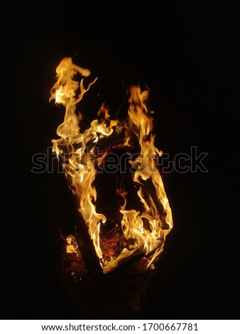 a frame set ablaze in fire