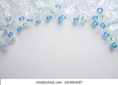 Frame Of Used Plastic Bottles Background. Recycle Concept