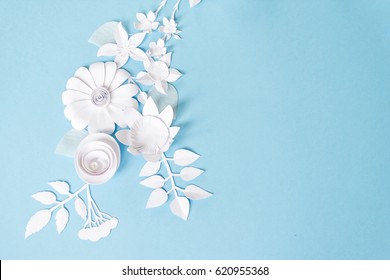Frame With White Paper Flowers On Blue Background