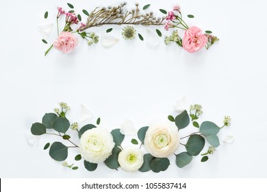 Frame Wreath With White Ranunculus Flowers On White Background. Flat Lay, Top View.