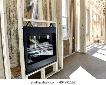 Framed Home Showing Installation Of A Gas Fireplace With Vent