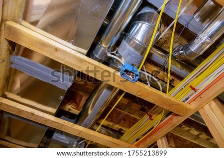 Framed residential home with basic rough pipe system of heating completed in new construction