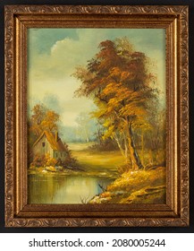 Framed Vintage Oil Painting Depicting A Small Cabin House Near A Lake And Woods.