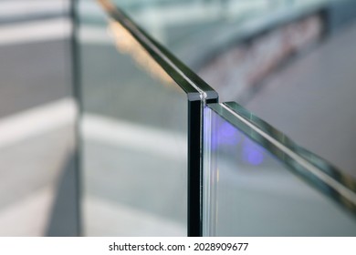 Frameless laminated tempered glass balcony railing. - Shutterstock ID 2028909677