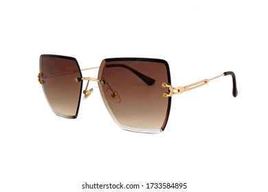 Frameless rectangular sunglasses and brown color gradient lenses   golden earpiece isolated white background  side view 