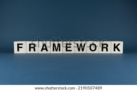 Framework. Cubes form the word Framework. Concept of technology framework and business