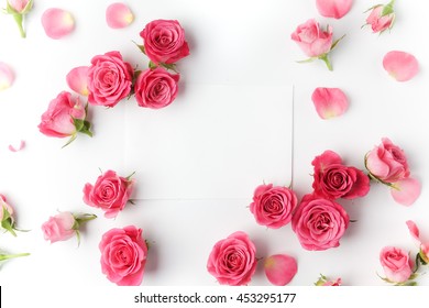 Framework from roses on white background. Flat lay. - Shutterstock ID 453295177
