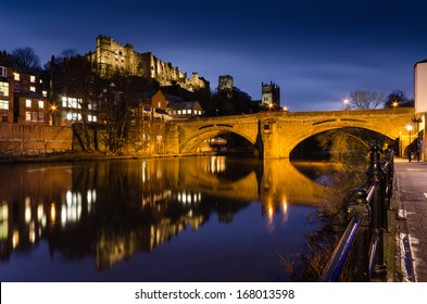 Framwellgate Bridge over River Wear at twilight / The Durham City skyline is dominated by its medieval castle and cathedral both sitting high above the River Wear