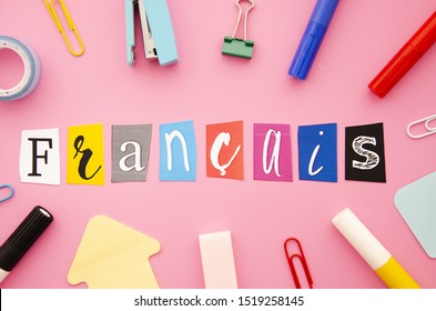 Francais lettering on pink background