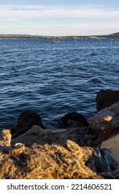 Sète, France - 10 02 2022 : Small Boat Of Fishermen On The Etang De Thau In The Early Morning