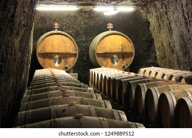 France. Alsace.  Old Wine Barrels In A Wine Cellar.