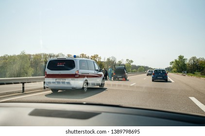 France - Apr 19, 2019: Driver Poit Of View POV At French Ambulance Offering Assistance To Car Involved In Road Highway Autoroute Accident With No Or Little Injuries