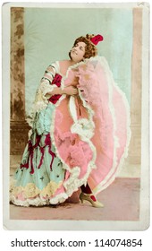 FRANCE - CIRCA 1902: A Vintage Postcard Printed In FRANCE Shows Hand Painted Photograph Of Beautiful French Dancer. Circa 1902.