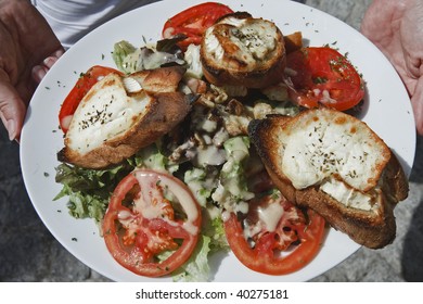 France, Corsica, Bobifacio, Tipical Corse Food, Tomatoes, Roasted Bread With Cheese, Mushrooms And Salad In Spicy Sauce, Olive Oil And Oregano