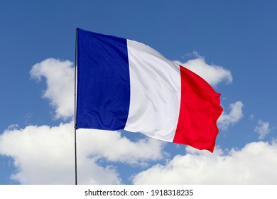 France flag isolated on the blue sky with clipping path. close up waving flag of France. flag symbols of France. - Shutterstock ID 1918318235