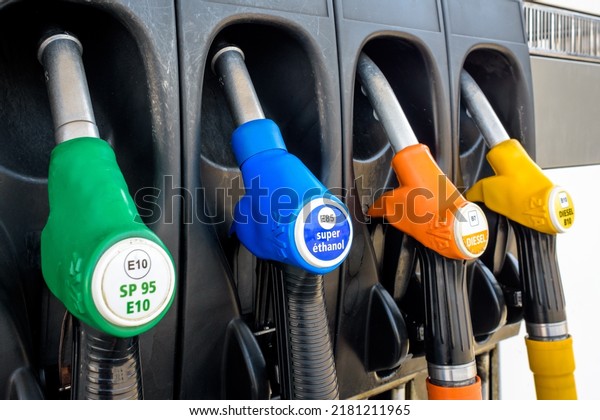 France - June 19, 2022: Close-up view of a four\
nozzle fuel pump at a gas station dispensing B10 Diesel (yellow),\
B7 Diesel (orange), E85 \
