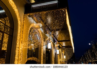 France, Paris - December 20 2020: Prince De Galles Luxurious Hotel With Christmas Lights On Avenue George V At Dusk