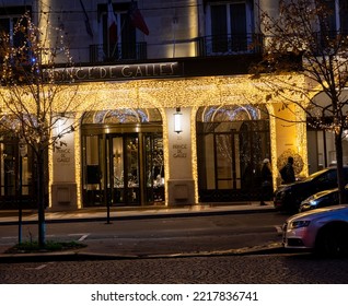 France, Paris - December 20 2020: Prince De Galles Luxurious Hotel With Christmas Lights On Avenue George V At Dusk