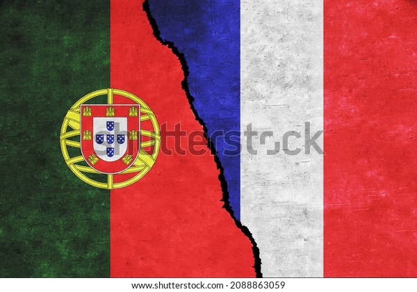 France and Portugal painted flags on a wall with\
a crack. France and Portugal conflict. Portugal and France flags\
together. France vs\
Portugal