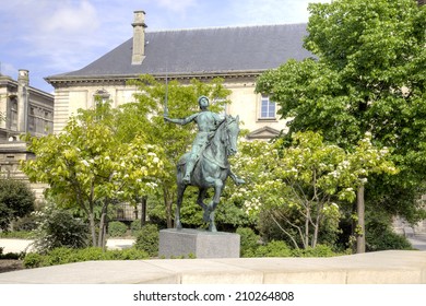 France, Reims - April 29.2014: Sculpture Of Joan Of Arc  In A Municipal Public Garden In The Historical Center Of City