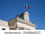 France Republic National flag liberte egalite fraternite, meaning in French liberty equality fraternity on facade marie of Arcachon city hall 