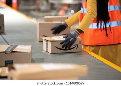 Vélizy, FRANCE Sept. 23th 2019 : 
Logistics activity on the Amazon site of Vélizy-Villacoublay in France. Packages are sorted by workers on coneyors.