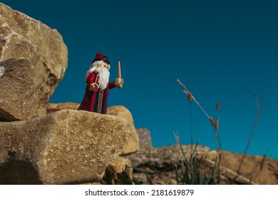 France,Jura - July 13, 2022
Albus Dumbledore Casting A Spell On A Headland. 
Lego Minifigure