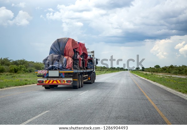 Francistown, Botswana, 7 January - 2019:\
Haulage truck with a full load on the open\
road.