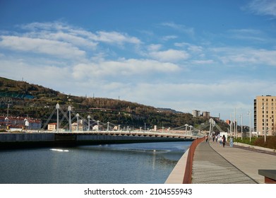 Frank Gehry Bridge Over The Nervión River To Join The Island Of Zorrozurre With The Deusto Neighborhood In Bilbao, Biscay, Basque Country, Spain